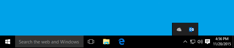 Screenshot shows the Outlook icon doesn't display on the taskbar, but appears in the notification area.