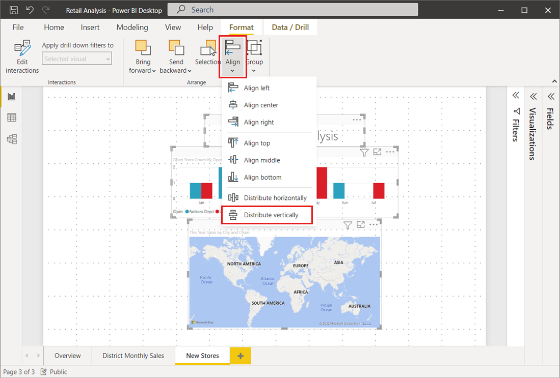 Screenshot of the report canvas, showing three visuals and the Distribute vertically option.