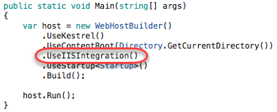 Screenshot of the C# Main method highlighting the host variable setting the reverse proxy server with the UseIISIntegration method.