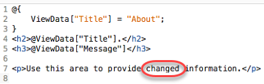 Screenshot of the C S H T M L file named About with a change to its text.