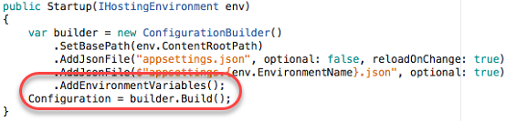 Screenshot of the Startup method, showing the builder variable adding environment variables and then using the Build method to build the configuration.
