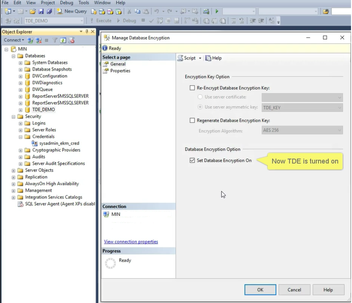 Screenshot of the Manage Database Encryption dialog box with the Set Database Encryption On option selected and a yellow banner that says Now TDE is turned on.