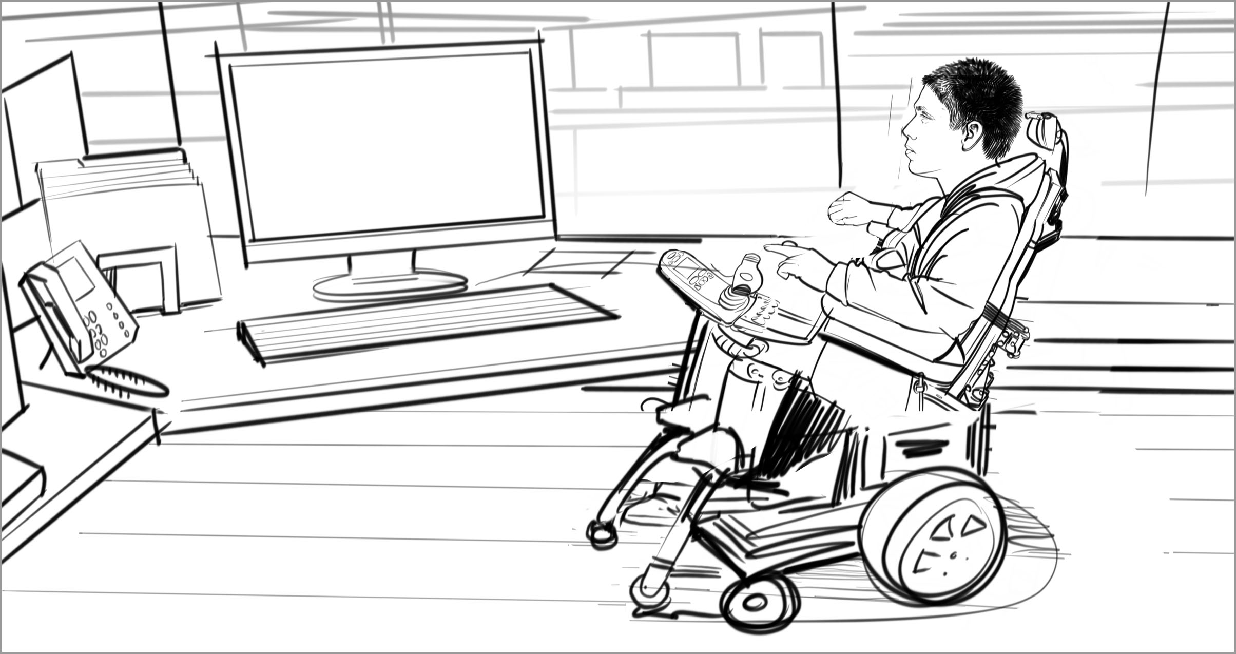 A man in a wheelchair moves toward a desk with a monitor and keyboard on it. His wheelchair has a tray that extends out in front of him so he won’t be able to slide his knees under the desk.