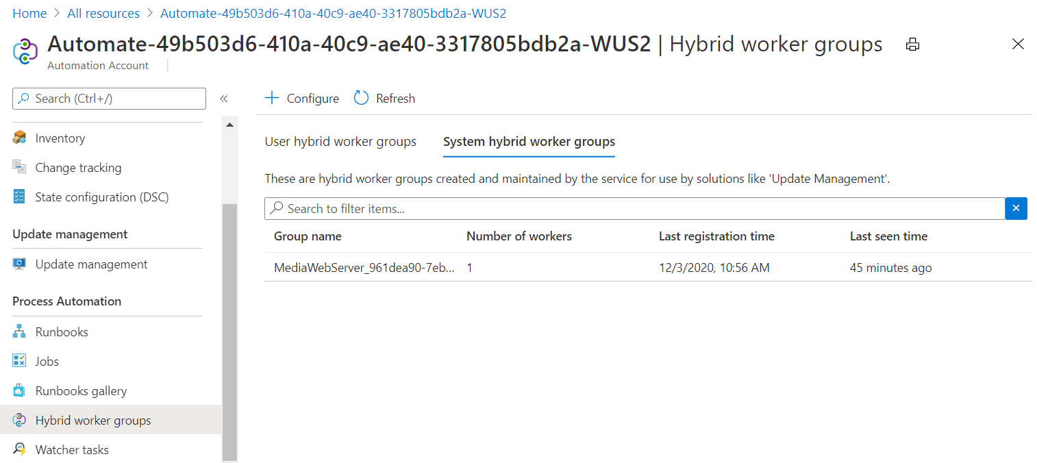 Screenshot that shows the VM as a system hybrid worker group for the Automation account.
