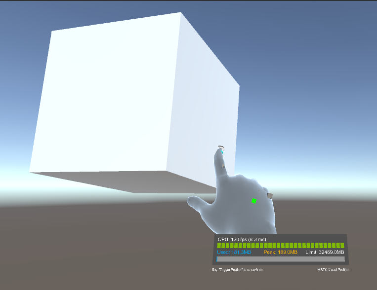 Screenshot of the simulated right hand touching the Near Cube.