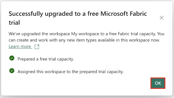 Screenshot of the Successfully upgraded to a free Microsoft Fabric trial pop-up window.