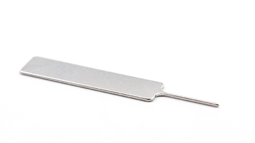 Photo of the SIM ejector tool to install SIM cards for Surface Laptop devices.