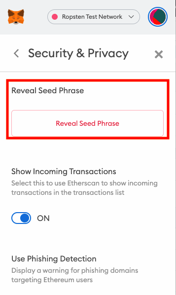 Screenshot showing how to reveal a seed phrase in MetaMask.