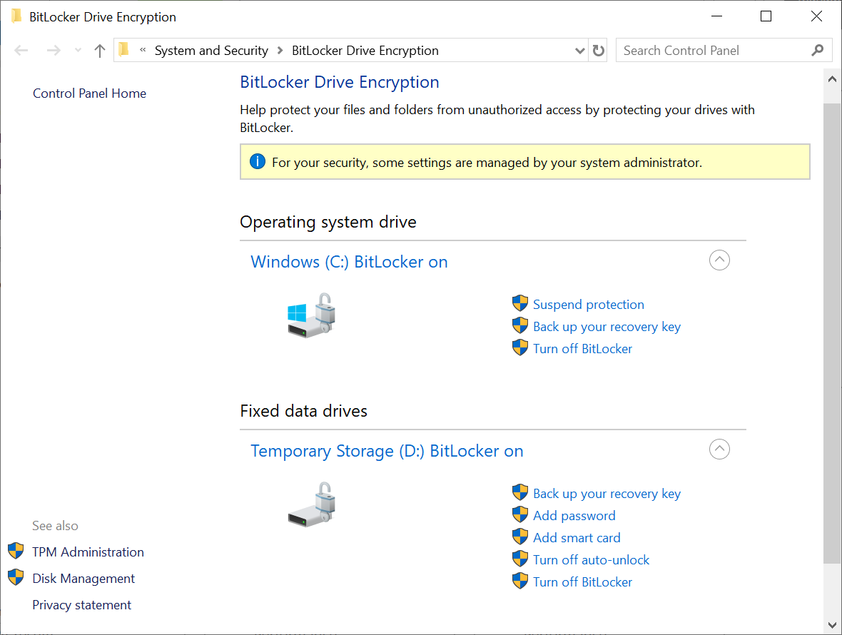 A screenshot of the Control Panel in a Windows VM. The administrator is reviewing the BitLocker settings for two drives. Both are enabled for BitLocker.