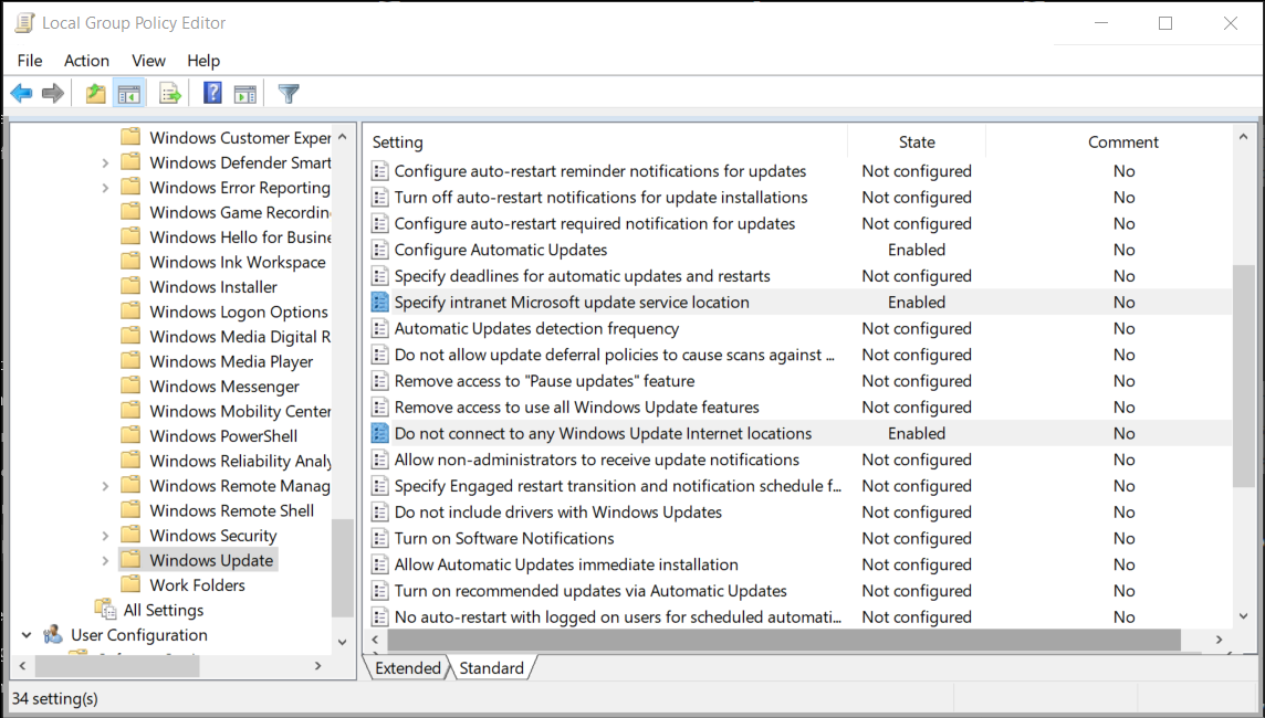 A screenshot of the Group Policy Editor in Windows. The administrator has navigated to the Windows Update folder and configured the Configure Automatic Updates, Specify intranet Microsoft Update service location, and Do not connect to any Windows Update Internet locations values.