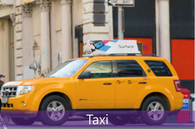 An image of a taxi with the label "Taxi".