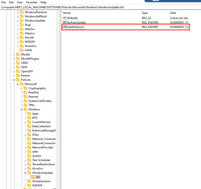 Screenshot of the Registry Editor for HKEY_LOCAL_MACHINE\SOFTWARE\Policies\Microsoft\Windows\WindowsUpdate\AU.