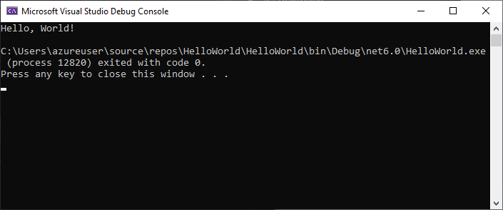 Screenshot of the Debug Console window showing the output Hello, World! and Press any key to close this window.