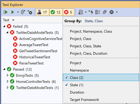 Screenshot of the Visual Studio Test Explorer showing  a test hierarchy in one pane and the Group By menu in the other with the Class and State options checked.