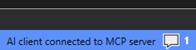 Screenshot of the WinDbg status bar showing that an AI client is connected to the MCP server.