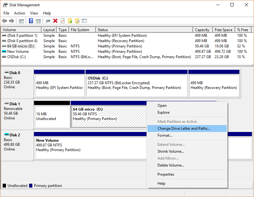 Screenshot showing the Disk Management window with the Change Drive Letter and Paths feature selected.