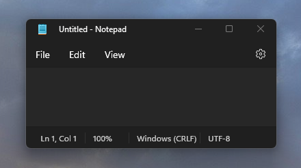A screenshot of the Notepad app on Windows 11 with rounded corners.