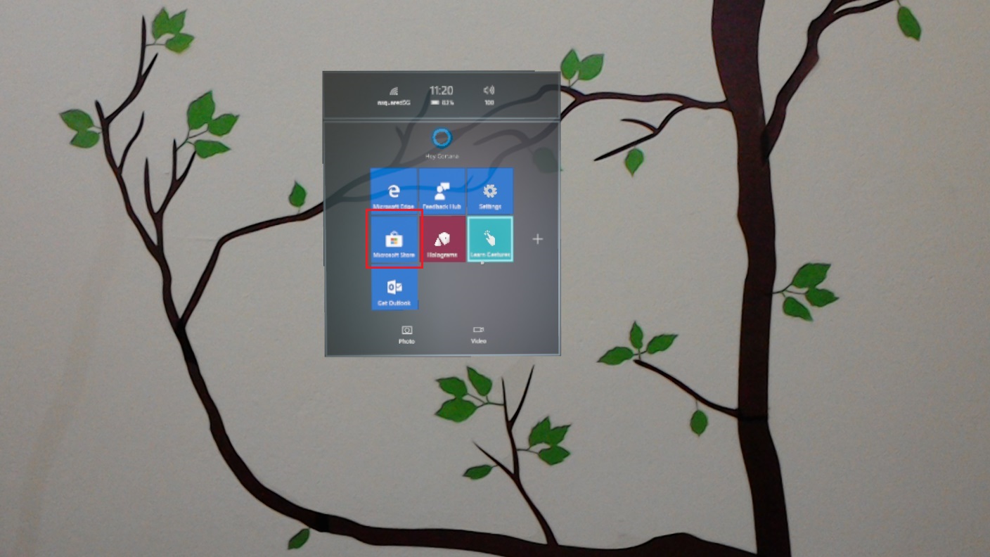Holo Lens display that shows a red circled around the Microsoft Store icon in a navigation window.