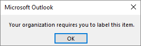 Aviso en Outlook donde se pide a un usuario que aplique una etiqueta necesaria.