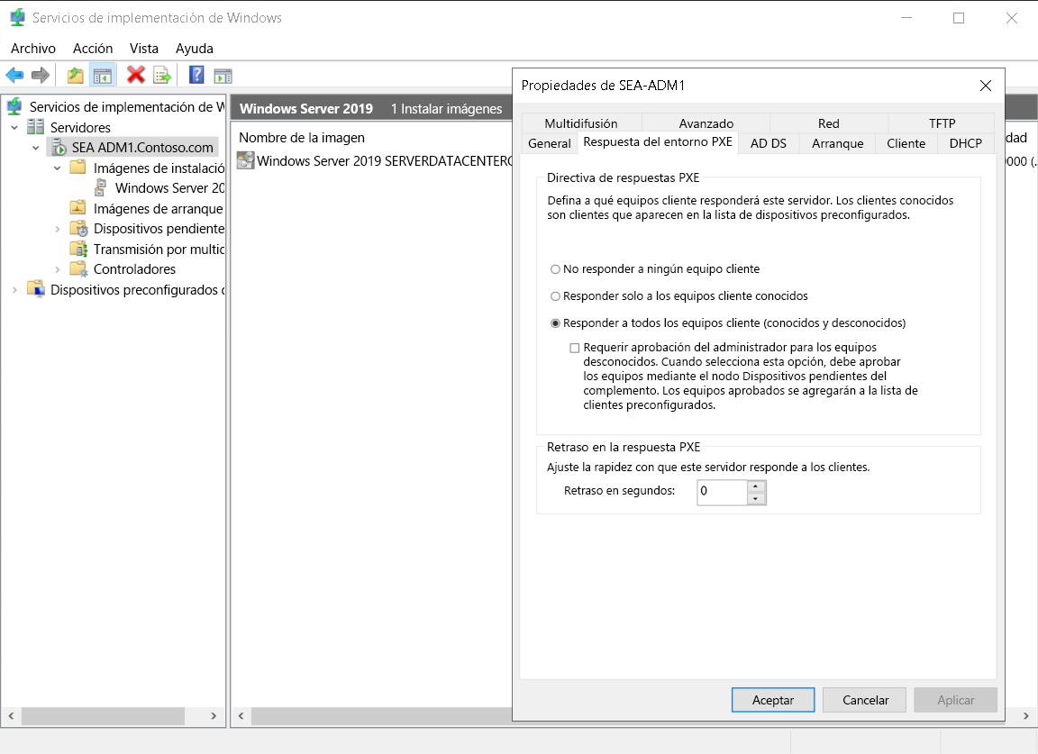 A screenshot of the Windows Deployment Services console with the SEA-ADM1 Properties dialog box overlaid. The administrator has selected the PXE Response tab, and has selected Respond to all client computers (known and unknown).