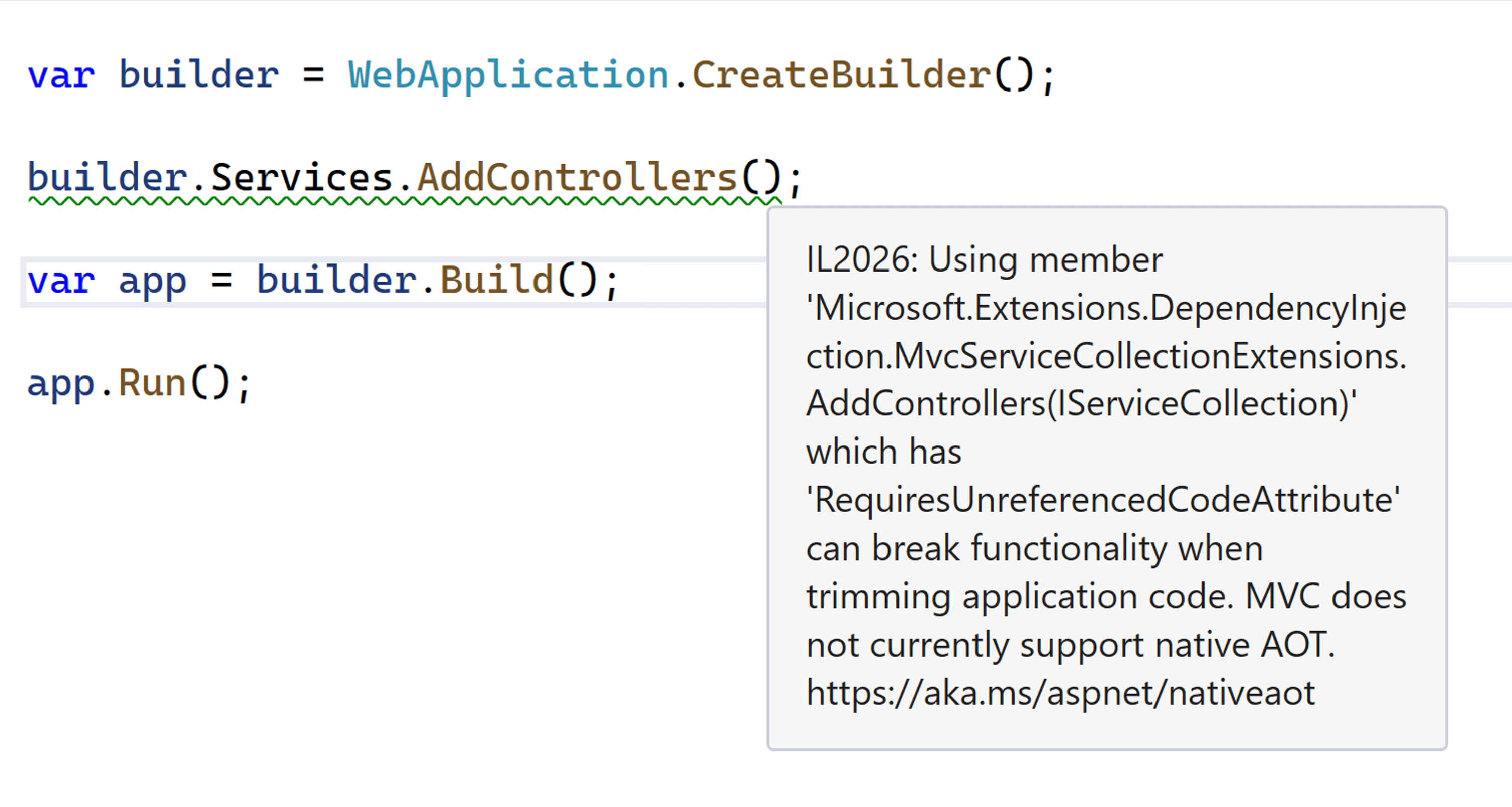 Ventana de Visual&nbsp;Studio que muestra el mensaje de advertencia IL2026 sobre el método AddControllers que indica que MVC no admite actualmente AOT nativo.