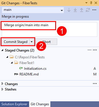 Captura de pantalla del mensaje de confirmación y el botón Confirmar elementos almacenados provisionalmente en la ventana Cambios de Git de Visual Studio.