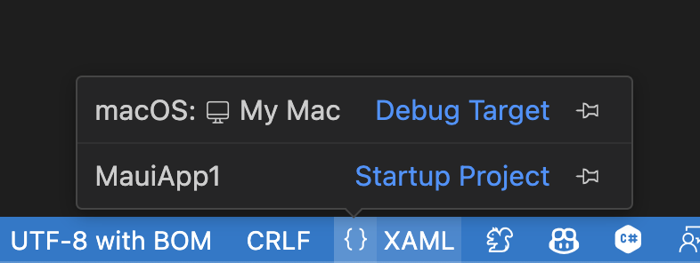 Captura de pantalla de la parte inferior derecha de Visual Studio Code, en la que se muestra el selector de destino de depuración abierto.