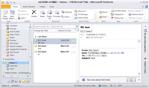 Captura de pantalla de la barra de estado de Outlook que muestra Online.