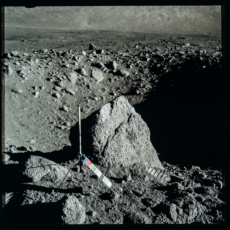Photo of the Moon's surface from the Apollo mission, showing a measuring device.
