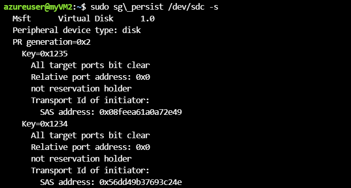 Disk status with VM1 and VM2 registrations.