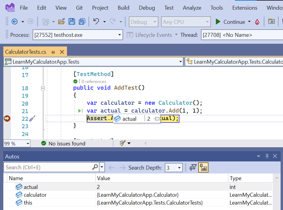 Screenshot that shows Visual Studio paused during debugging, with debugger windows visible.