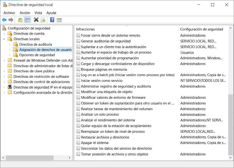 A screenshot of the Local Security Policy console. The administrator has selected the User Rights Assignment node, and displayed in the details pane are policies and security settings.