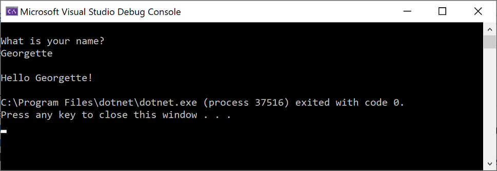 Captura de pantalla de la ventana de la Consola de depuración de Microsoft Visual Studio en la que se muestra el mensaje de solicitud de un nombre, la entrada y la salida 