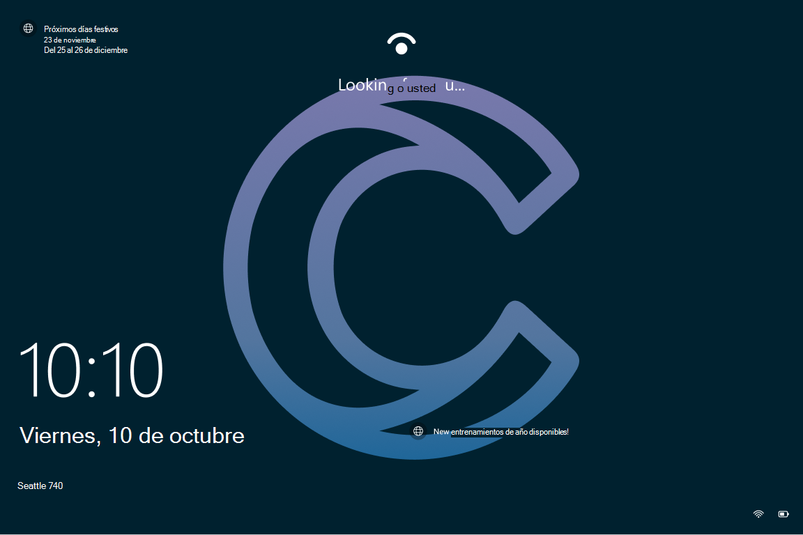 Captura de pantalla de la pantalla de bloqueo de Windows 10 con el contenido destacado de Windows habilitado sobre un fondo de pantalla de la organización.