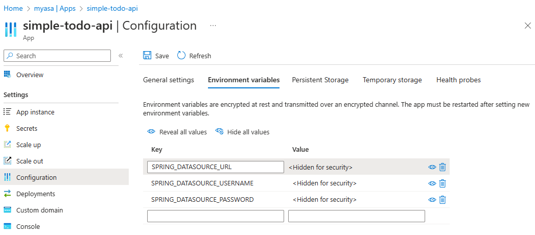 Captura de pantalla de Azure Portal que muestra la pestaña Variables de entorno con todos los valores de la conexión de PostgreSQL.