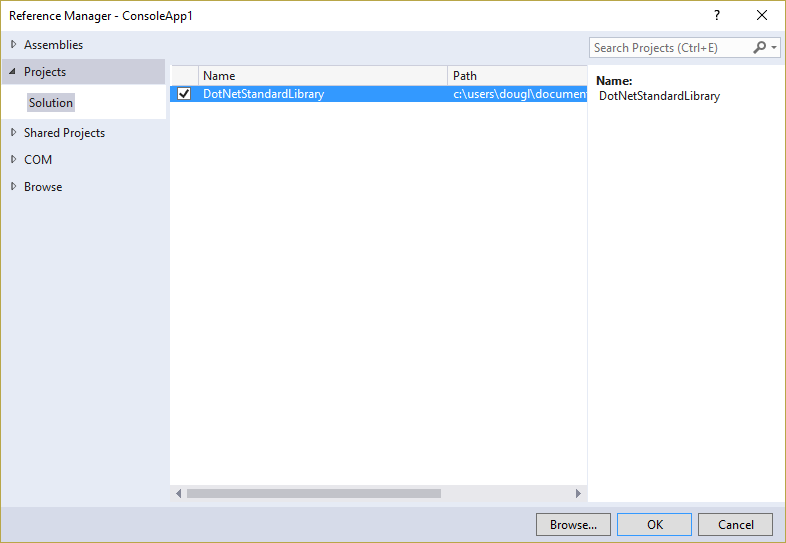 In Visual Studio, right-click on the References node and choose Add Reference... then switch to the Solution Projects tab as shown Referencing a .NET Standard Library