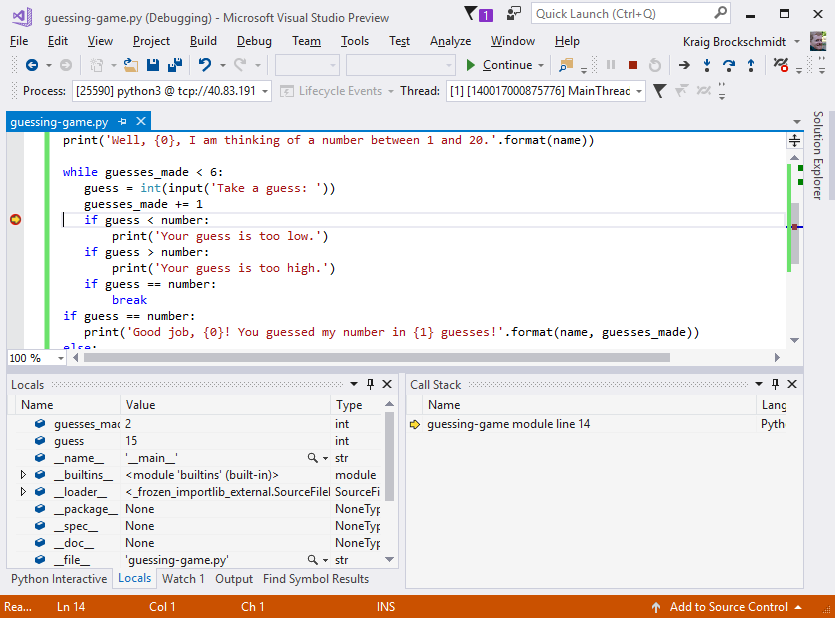 Screenshot that shows how Visual Studio pauses debugging when a breakpoint is hit.