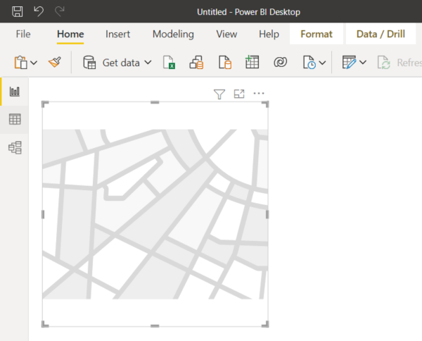 Capture d’écran d’un visuel de carte de formes vide sur le canevas du rapport.
