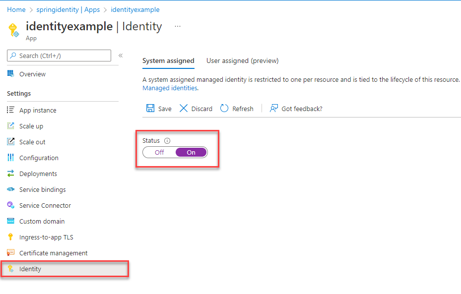 Capture d’écran de Portail Azure page Identité de la ressource d’application avec l’onglet Affecté par le système montrant et le champ État mis en surbrillance.