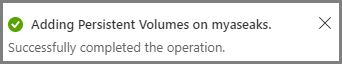 Capture d’écran montrant une boîte de dialogue Notifications indiquant que l’opération Ajout de volumes persistants a été correctement effectuée.