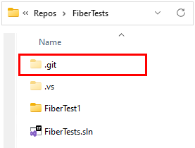 Capture d’écran du dossier Git, du fichier Git ignore et du fichier d’attributs Git dans l’Explorateur de fichiers Windows.