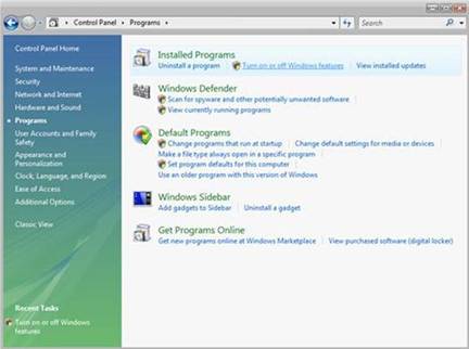 Capture d’écran du menu Accueil Panneau de configuration. Les programmes installés sont mis en surbrillance. Activer ou désactiver les fonctionnalités Windows est sélectionné.