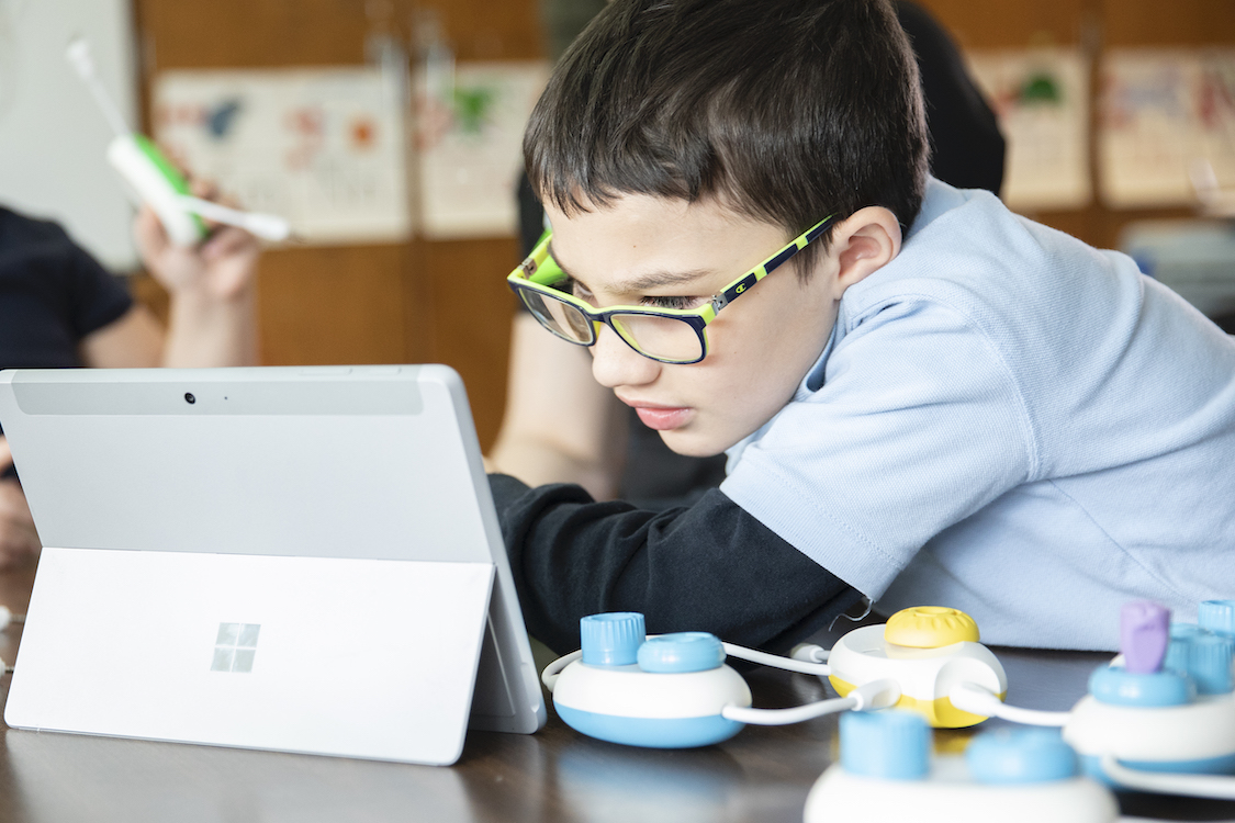 Photo of a student using Code Jumper with a Surface tablet.