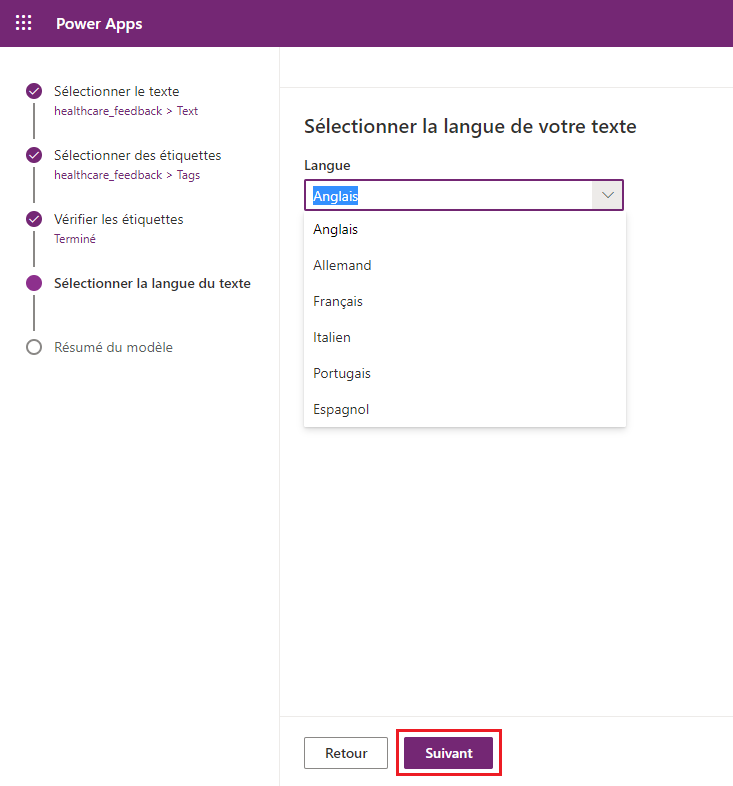 Capture d’écran du modèle Classification par catégorie dans Power Apps Studio, avec une liste déroulante de langues où l’option Anglais est sélectionnée et le bouton Suivant mis en évidence.