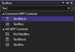 Capture d’écran de la fenêtre Boîte à outils avec le contrôle TextBlock sélectionné dans la liste des contrôles WPF courants.