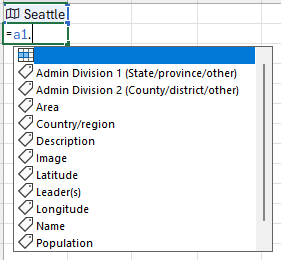 Captura de pantalla del uso de la notación de puntos en una fórmula con =A1. Para mostrar los campos del tipo de datos Geografía de Seattle.
