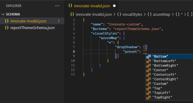 Captura de pantalla del uso del esquema de temas de informe para identificar las opciones de formato disponibles. En el menú Autocompletar de Visual Studio Code se muestran las opciones de formato disponibles.