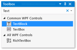 Screenshot of the Toolbox window with the TextBlock control selected in the list of Common WPF Controls. Toolbox with the TextBlock control highlighted