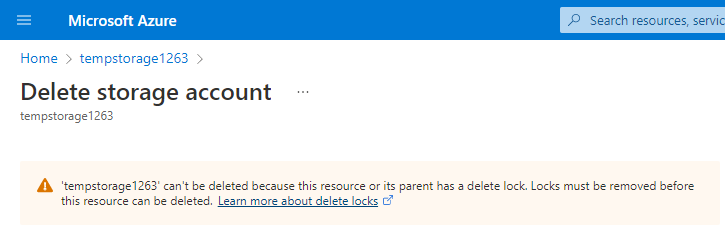 Screenshot of the Delete storage account error, explaining that a resource lock prevents deletion.