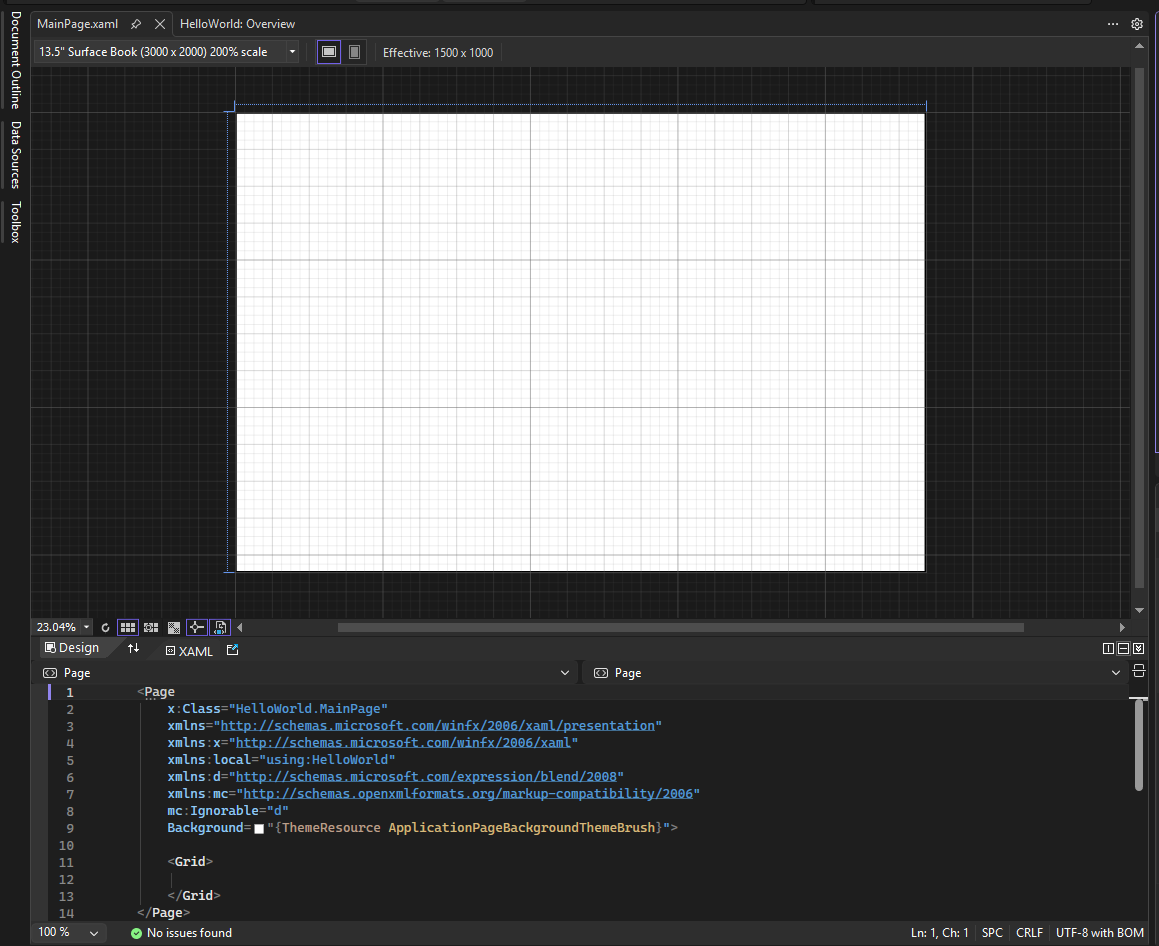 Képernyőkép a MainPage.xaml megnyitásáról a Visual Studio IDE-ben. Az XAML Designer panel üres tervezőfelületet, az XAML-szerkesztő panel pedig az XAML-kód egy részét jeleníti meg.